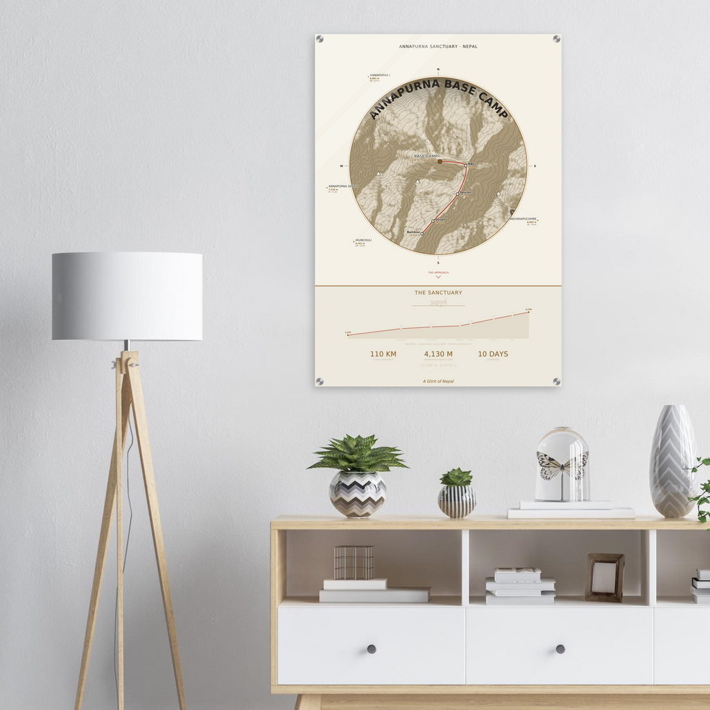 Annapurna Base Camp trek route map in the light colourway, shown as an acrylic glass print mounted on a wall. Jhilke Studio.