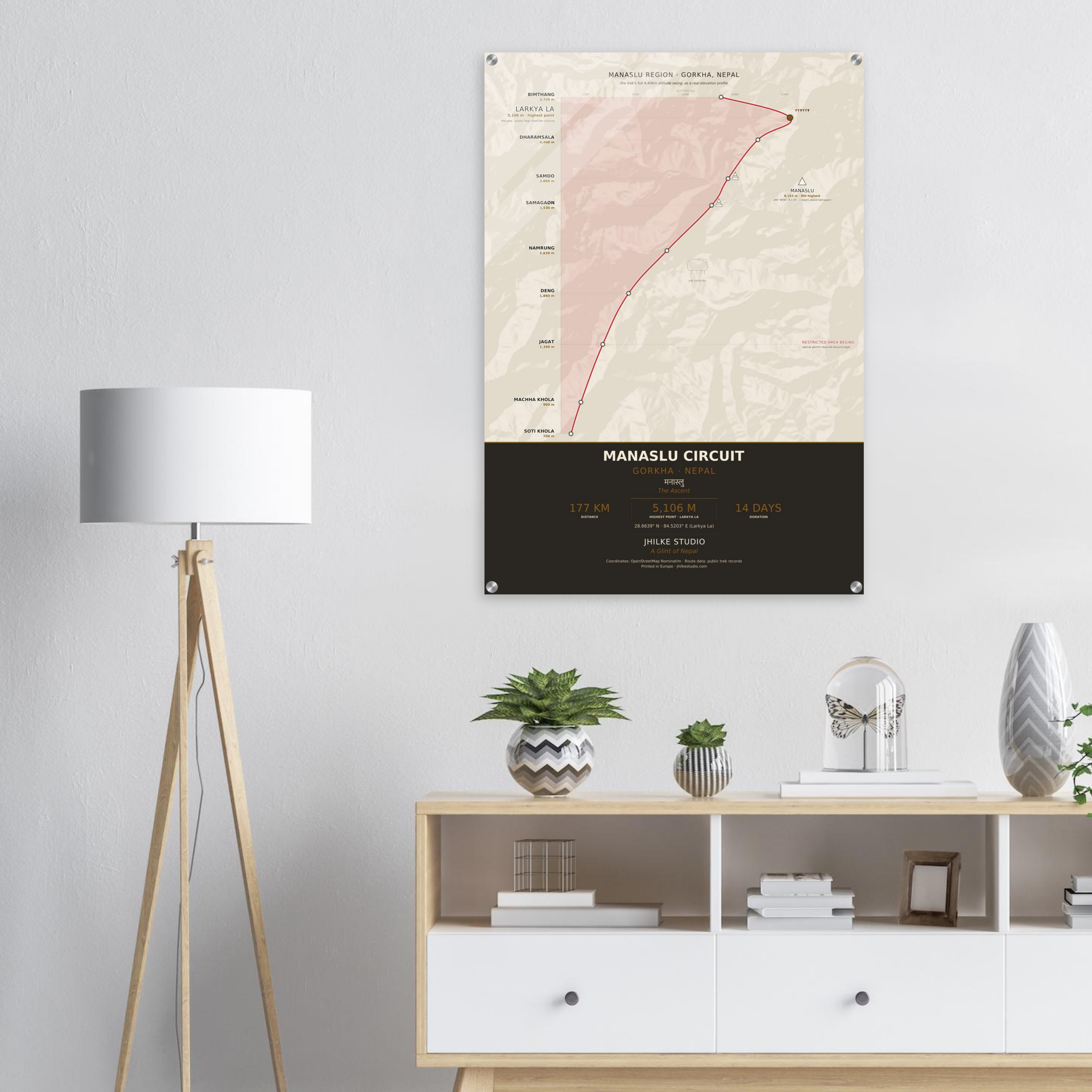 Manaslu Circuit trek route map in the light colourway, shown as an acrylic glass print mounted on a wall. Jhilke Studio.