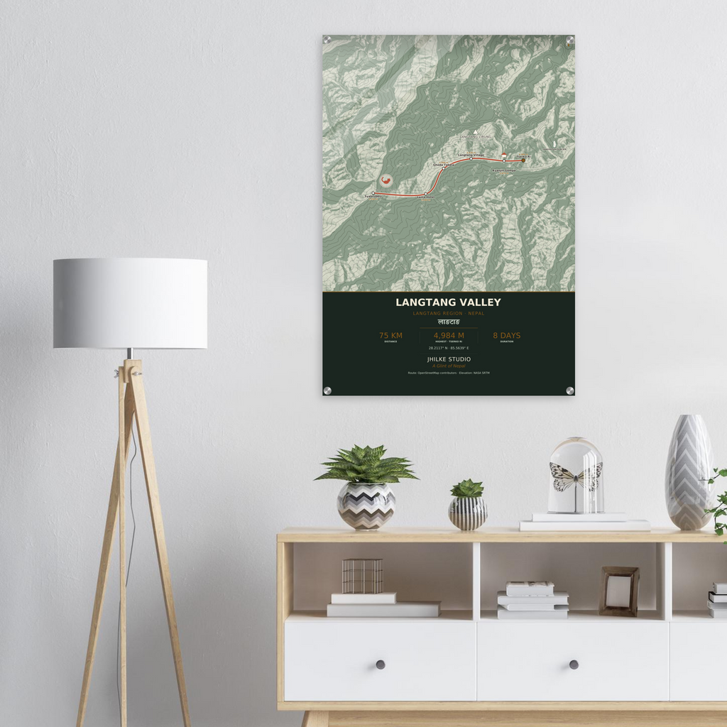 Langtang Valley trek route map in the light colourway, shown as an acrylic glass print mounted on a wall. Jhilke Studio.