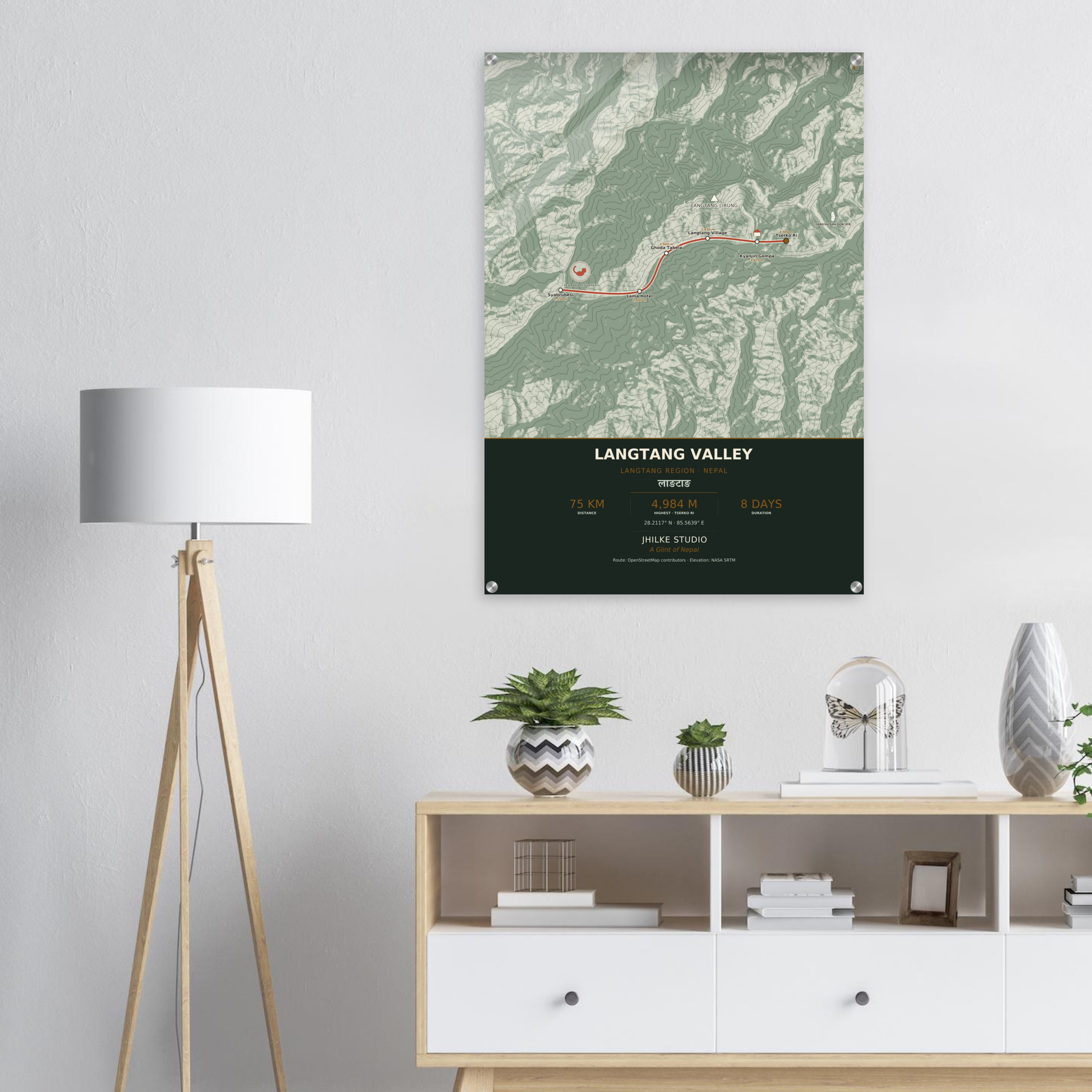 Langtang Valley trek route map in the light colourway, shown as an acrylic glass print mounted on a wall. Jhilke Studio.