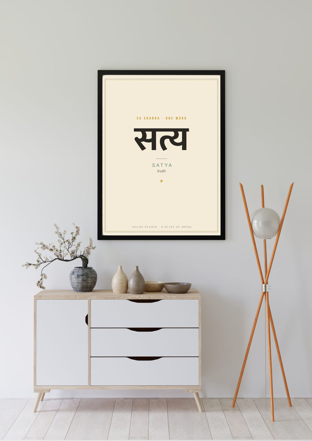 Satya — Sanskrit word print, black frame, above sideboard